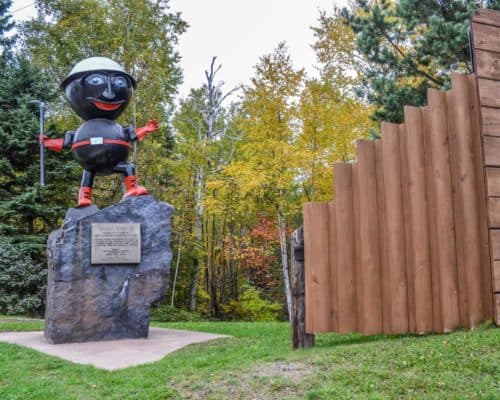 He sits atop of a chunk of taconite.